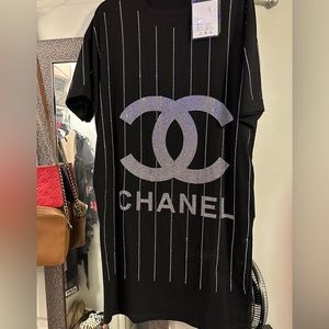 Black channel size small new never worn